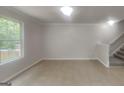 Spacious living room with large windows and tile flooring at 1699 Redan West, Lithonia, GA 30058