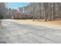 Ranch house with long driveway at 140 Alford Dr, Fayetteville, GA 30215