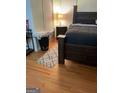 Bedroom with hardwood floors and walk in closet at 190 Oakwood Lakes Dr, Hampton, GA 30228