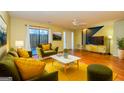 Bright living room with hardwood floors, and patio access at 172 Twiggs Cor, Peachtree City, GA 30269