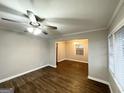 Spacious living room with hardwood floors and neutral walls at 4303 Mercer Rd, Decatur, GA 30035