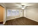 Bright living room featuring hardwood floors and a large window at 4303 Mercer Rd, Decatur, GA 30035