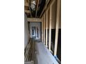 Unfinished interior hallway with exposed framing at 837 Metropolitan Pkwy, Atlanta, GA 30310