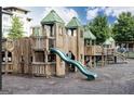 Wooden castle-themed playground with slide at 1977 Boyd Trace Nw Ln, Atlanta, GA 30318