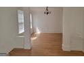 Bright dining room with hardwood floors and wainscoting at 1345 Pinebreeze Way, Marietta, GA 30062