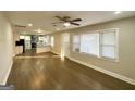 Open concept living and kitchen with hardwood floors and modern kitchen at 1996 Meadow Ln, Decatur, GA 30032