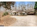 House with carport and long driveway at 304 Slaughter Rd, Hampton, GA 30228