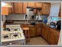 Cozy kitchen with wood cabinets and laminate counters at 3798 Adkins Nw Rd, Atlanta, GA 30331