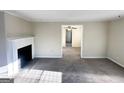 Bright living room with a fireplace and an open floor plan at 1876 Flat Shoals Se Rd, Atlanta, GA 30316