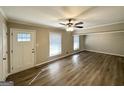 Bright living room with hardwood floors and an entryway at 3721 W Potomac Dr, East Point, GA 30344