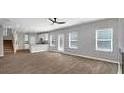Open living room with kitchen and neutral tones at 5324 Tolar Rd # 28, South Fulton, GA 30213
