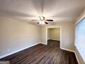 Bright living room with hardwood floors and ceiling fan at 2780 Mitchell Dr, Decatur, GA 30032