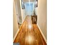 Bright and spacious entryway with hardwood floors and decorative console table at 6356 Hickory Lane Cir, Union City, GA 30291
