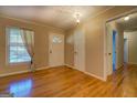 Hardwood floors and neutral walls create a bright and airy living space at 155 Island Shoals Rd, Covington, GA 30016