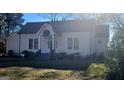 Light beige craftsman home, nicely landscaped at 213 W Hightower Trl, Social Circle, GA 30025