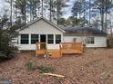 Home features a deck and private backyard at 1276 Turner Church Rd, Mcdonough, GA 30252