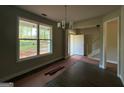 Inviting entryway with natural light and a view of the staircase for a charming and welcoming first impression at 142 Asa Moseley Rd, Mcdonough, GA 30252