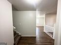 Bright entryway with staircase and hardwood floors at 5515 Saint Lo Ln, College Park, GA 30349