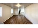 Spacious living room with hardwood floors at 5515 Saint Lo Ln, College Park, GA 30349