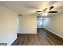 Spacious living room with hardwood floors and ceiling fan at 3961 Cornell Sw Blvd, Atlanta, GA 30331
