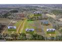 Aerial view of various lots, showing surrounding landscape, homes, and acreage sizes at 123 Oak Road, Locust Grove, GA 30248