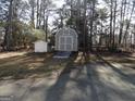 Spacious backyard with storage shed and workshop at 553 Highway 279, Fayetteville, GA 30214
