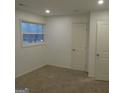 Bright bedroom with carpet and neutral walls at 553 Highway 279, Fayetteville, GA 30214