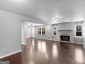 Spacious living room with hardwood floors and fireplace at 215 Elliott Rd, Mcdonough, GA 30252