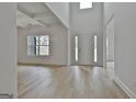 Bright entryway with hardwood floors and high ceilings at 214 Wet Wood Ct # 26, Fairburn, GA 30213