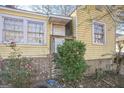 House exterior showcasing the front entrance and landscaping at 1826 E Farris Ave, East Point, GA 30344