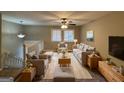 Spacious living room with light hardwood floors and neutral decor at 1139 Pine Mountain Dr, Forest Park, GA 30297