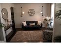 Cozy living room featuring a comfy couch and stylish decor at 2496 Osceola Rd, Lithonia, GA 30058