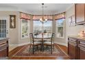 Breakfast nook with bay window and chandelier at 409 Brandy Ln, Mcdonough, GA 30253