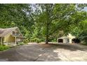 House with circular driveway and detached workshop at 731 Airline Rd, Mcdonough, GA 30252