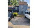 Two-story townhome with a small yard at 1051 Mariners Ct, Stone Mountain, GA 30083