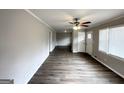 Bright and airy living area with hardwood floors and neutral walls at 1931 Sandringham Sw Dr, Atlanta, GA 30311