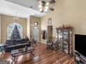 Spacious living room with hardwood floors and a vaulted ceiling at 225 Lakepointe Ct, Stockbridge, GA 30281