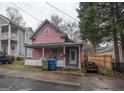 Brick home with front porch and street view at 613 Mc Donald Se St, Atlanta, GA 30312