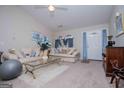 Bright living room with vaulted ceiling and comfy seating at 1391 Lakeview Pkwy, Villa Rica, GA 30180