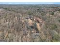 Secluded property with a large lot and surrounding woods at 2535 Rock Springs Rd, Buford, GA 30519