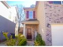 Two-story home with dark brown door and landscaping at 11958 Quail Dr, Hampton, GA 30228