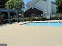 Community pool with lounge chairs and pergola at 2567 Laurel Nw Cir, Atlanta, GA 30311