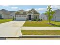 New construction home with curb appeal and stone accents at 361 Elkins Pl, Peachtree City, GA 30269