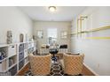 Spacious home office featuring hardwood floors and stylish decor at 361 Elkins Pl, Peachtree City, GA 30269