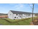 New townhomes feature sodded rear yards with fence and patio at 313 Sound Cir # 140, Stockbridge, GA 30281