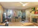 Living room featuring a fireplace and comfortable seating at 245 Mckenzie Dr, Stockbridge, GA 30281