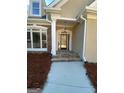 Inviting front entry with stone steps and a double door at 45 Gardenia Ct, Oxford, GA 30054