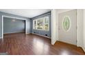 Living room with hardwood floors and neutral walls at 241 Simon Ter, Atlanta, GA 30338