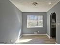 Bright dining area with gray walls and wood-look flooring at 6665 Cedar Hurst Trl, College Park, GA 30349