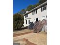 Front view of a two-story house with stairs and landscaping at 112 Jennifer Sw Ln, Marietta, GA 30060